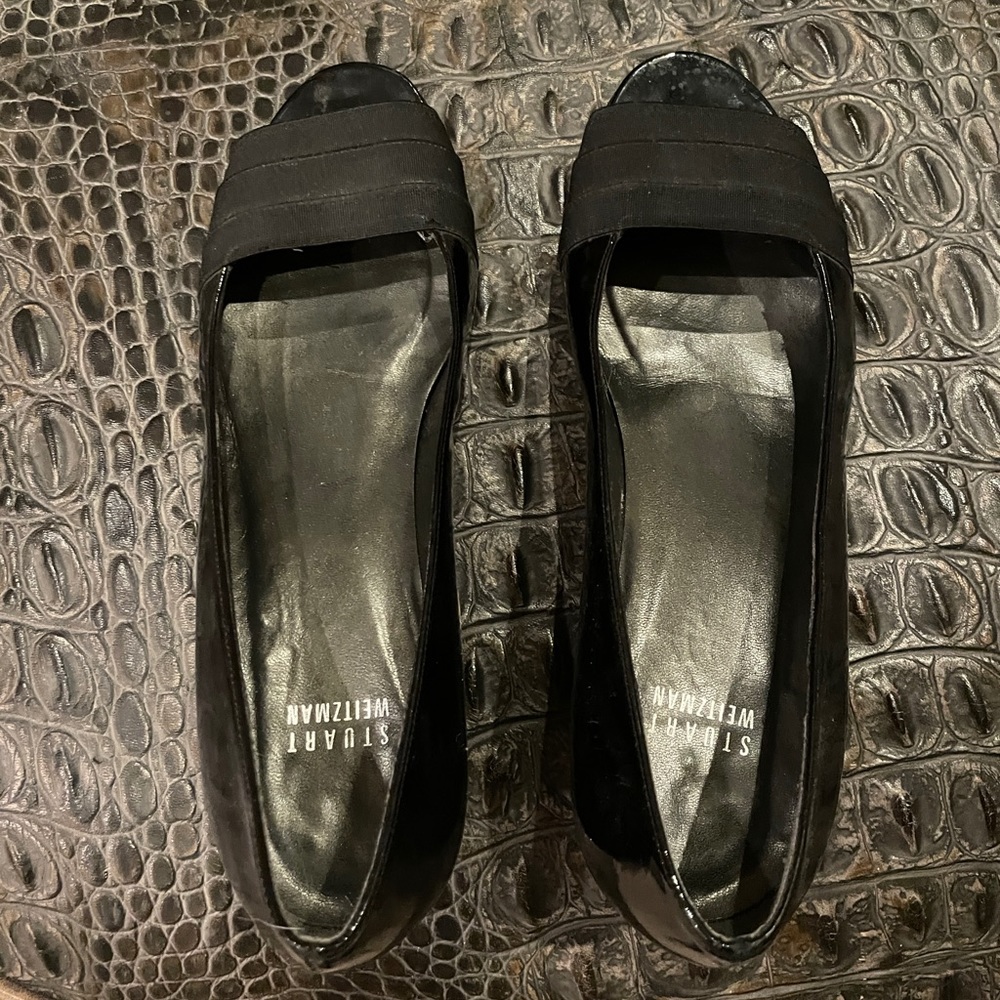 Size 7 Stuart Weitzman heels.  Black patent leather with fabric accent.